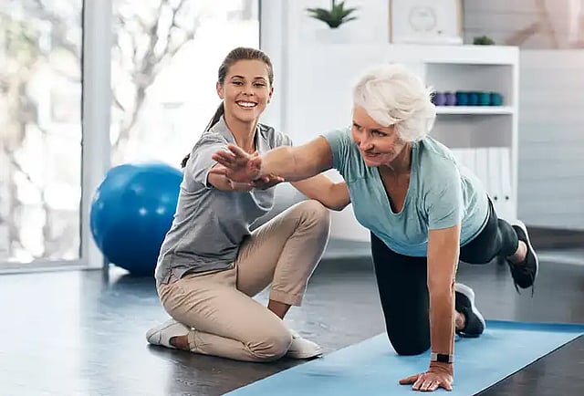 elderly woman getting help with dizziness and balance