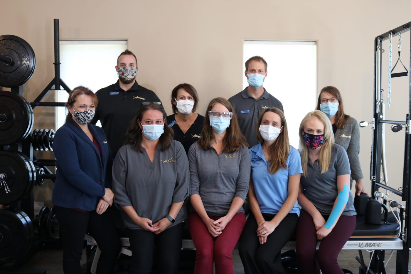 Advantage Rehab staff promoting the use of masks in the office to keep patients and staff members safe and healthy