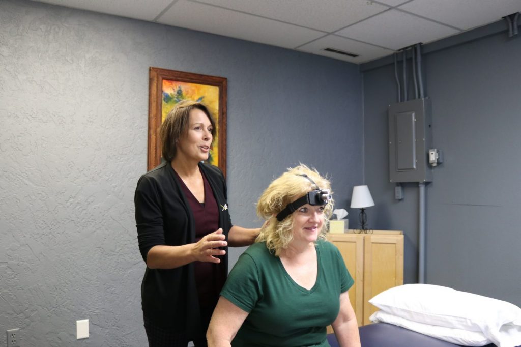 Headache and neck pain management using laser target exercises in Powell Wyoming